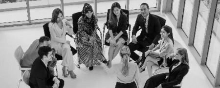 businesswomen businessmen group meeting uds photoaidcom greyscale 450x181