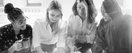 four diverse business women